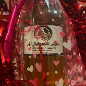A Fashionable Affair Natural Hair Growth Oil &Hot Oil Treatment by: Lisa Johnson